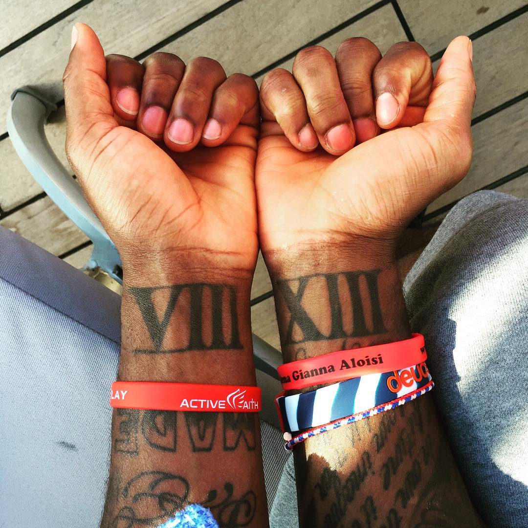 Kyrie irving tattoos forearm